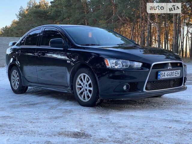 Чорний Міцубісі Lancer Ralliart, об'ємом двигуна 2 л та пробігом 149 тис. км за 10600 $, фото 26 на Automoto.ua