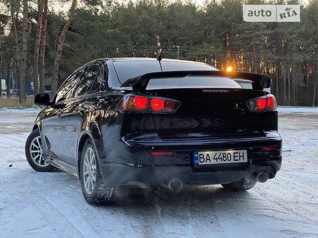 Черный Мицубиси Lancer Ralliart, объемом двигателя 2 л и пробегом 149 тыс. км за 10600 $, фото 80 на Automoto.ua