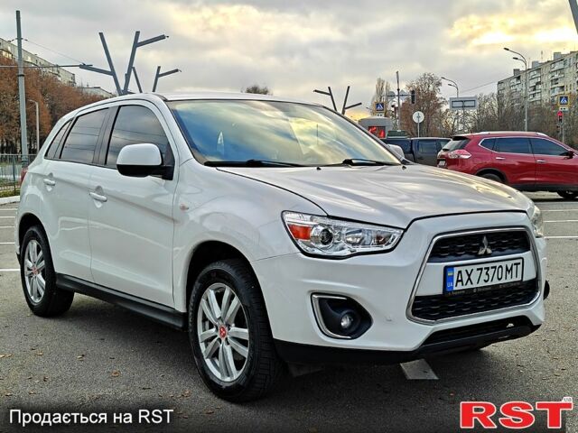 Білий Міцубісі Outlander Sport, об'ємом двигуна 2 л та пробігом 240 тис. км за 8799 $, фото 5 на Automoto.ua