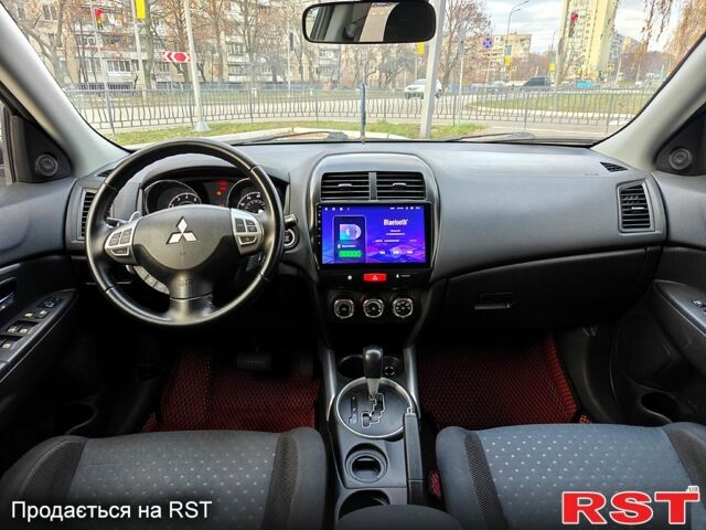 Білий Міцубісі Outlander Sport, об'ємом двигуна 2 л та пробігом 240 тис. км за 8799 $, фото 11 на Automoto.ua