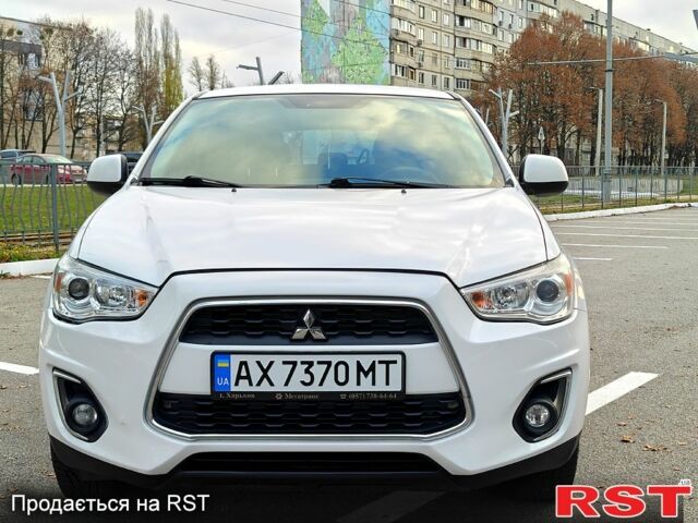 Білий Міцубісі Outlander Sport, об'ємом двигуна 2 л та пробігом 240 тис. км за 8799 $, фото 6 на Automoto.ua