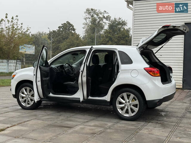 Белый Мицубиси Outlander Sport, объемом двигателя 2 л и пробегом 160 тыс. км за 10800 $, фото 36 на Automoto.ua