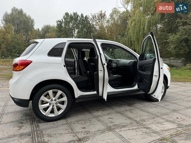 Белый Мицубиси Outlander Sport, объемом двигателя 2 л и пробегом 160 тыс. км за 10800 $, фото 12 на Automoto.ua