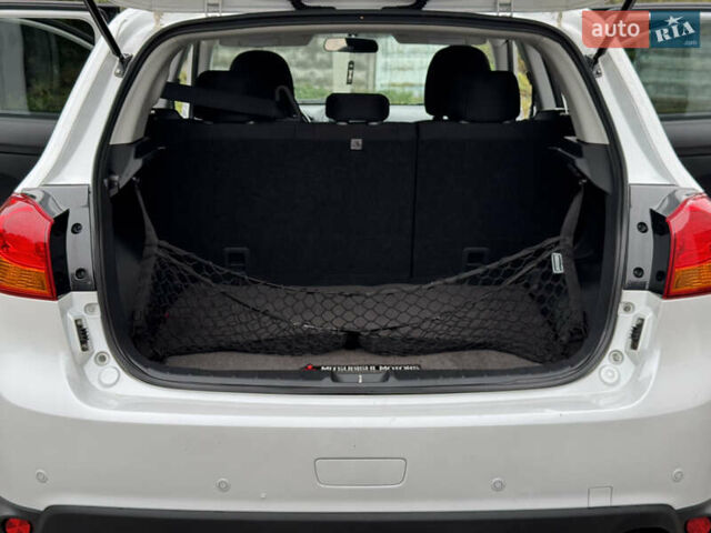 Белый Мицубиси Outlander Sport, объемом двигателя 2 л и пробегом 160 тыс. км за 10800 $, фото 38 на Automoto.ua