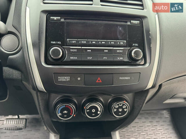 Белый Мицубиси Outlander Sport, объемом двигателя 2 л и пробегом 160 тыс. км за 10800 $, фото 23 на Automoto.ua