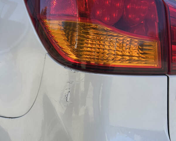 Белый Мицубиси Outlander Sport, объемом двигателя 2 л и пробегом 255 тыс. км за 12000 $, фото 20 на Automoto.ua