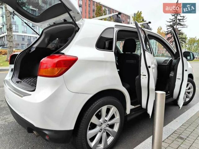 Белый Мицубиси Outlander Sport, объемом двигателя 2.4 л и пробегом 207 тыс. км за 9990 $, фото 21 на Automoto.ua