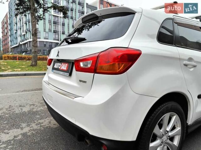 Белый Мицубиси Outlander Sport, объемом двигателя 2.4 л и пробегом 207 тыс. км за 9990 $, фото 20 на Automoto.ua