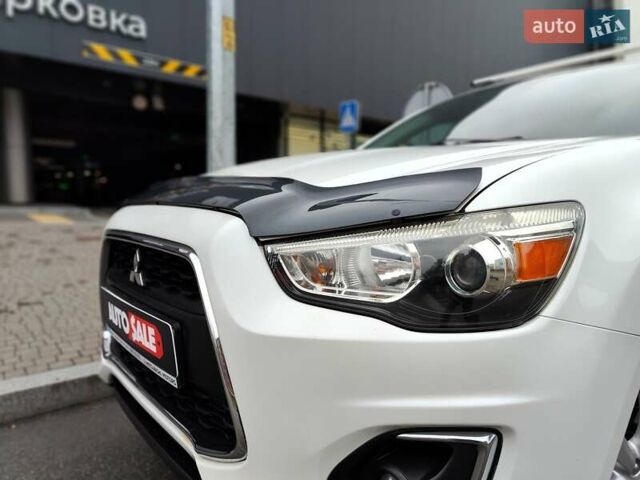 Белый Мицубиси Outlander Sport, объемом двигателя 2.4 л и пробегом 207 тыс. км за 9990 $, фото 1 на Automoto.ua