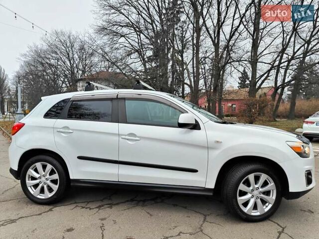 Белый Мицубиси Outlander Sport, объемом двигателя 2.4 л и пробегом 207 тыс. км за 9990 $, фото 22 на Automoto.ua