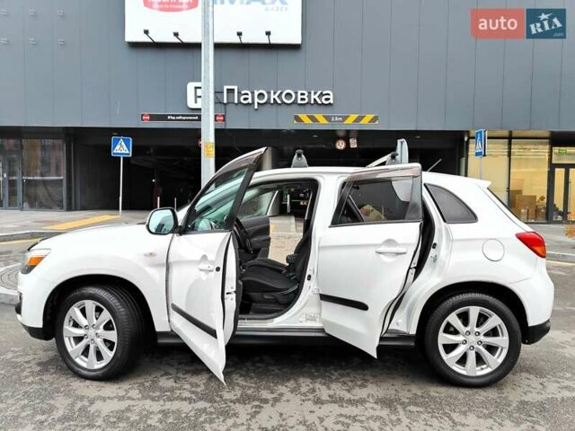Белый Мицубиси Outlander Sport, объемом двигателя 2.4 л и пробегом 207 тыс. км за 9990 $, фото 10 на Automoto.ua