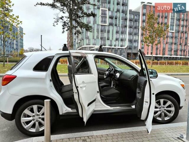 Белый Мицубиси Outlander Sport, объемом двигателя 2.4 л и пробегом 207 тыс. км за 9990 $, фото 27 на Automoto.ua