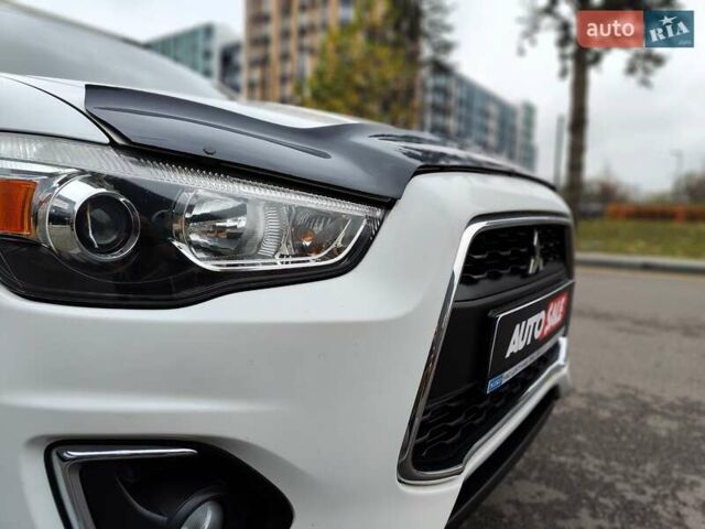 Белый Мицубиси Outlander Sport, объемом двигателя 2.4 л и пробегом 207 тыс. км за 9990 $, фото 33 на Automoto.ua