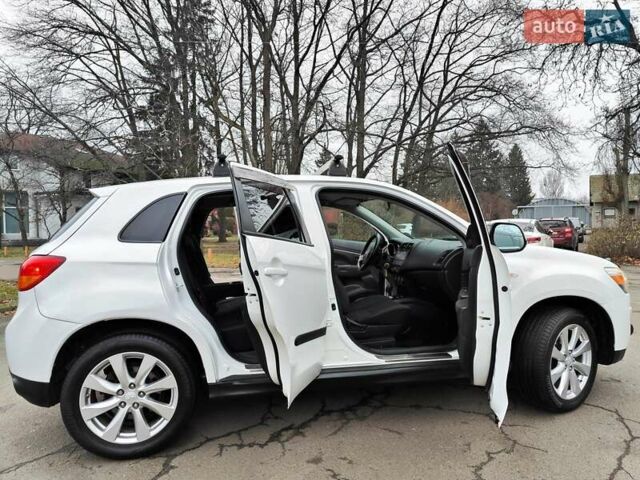 Белый Мицубиси Outlander Sport, объемом двигателя 2.4 л и пробегом 207 тыс. км за 9990 $, фото 20 на Automoto.ua