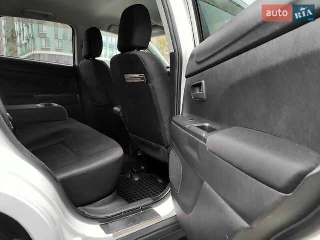 Белый Мицубиси Outlander Sport, объемом двигателя 2.4 л и пробегом 207 тыс. км за 9990 $, фото 42 на Automoto.ua