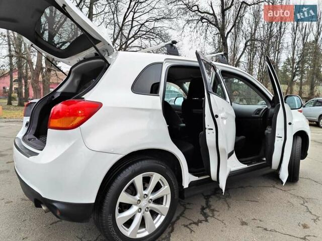 Белый Мицубиси Outlander Sport, объемом двигателя 2.4 л и пробегом 207 тыс. км за 9990 $, фото 17 на Automoto.ua