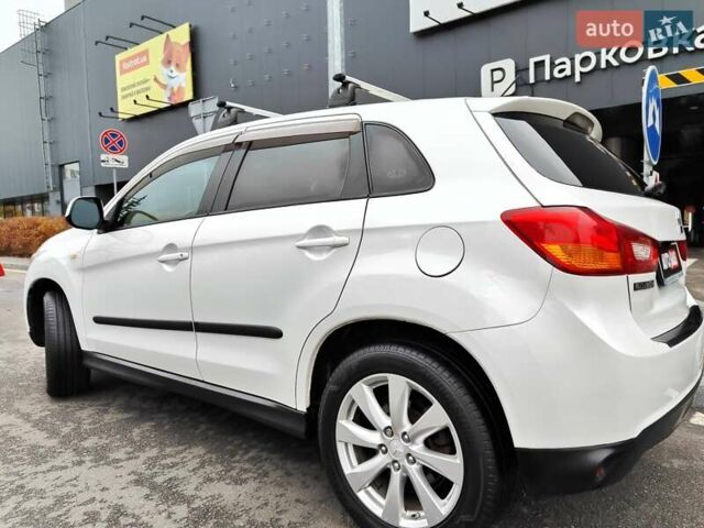 Белый Мицубиси Outlander Sport, объемом двигателя 2.4 л и пробегом 207 тыс. км за 9990 $, фото 13 на Automoto.ua