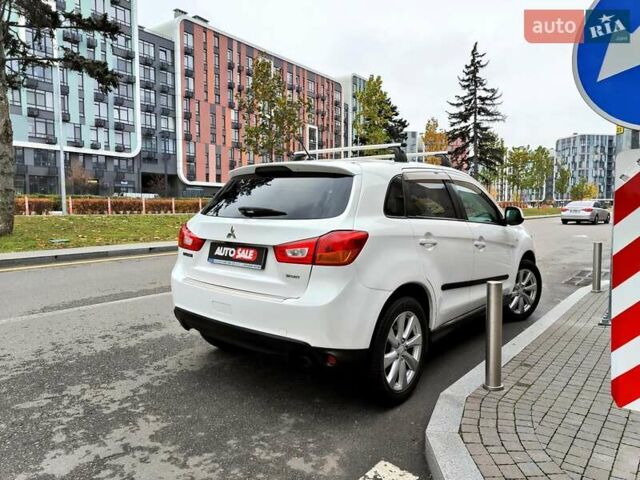 Белый Мицубиси Outlander Sport, объемом двигателя 2.4 л и пробегом 207 тыс. км за 9990 $, фото 26 на Automoto.ua