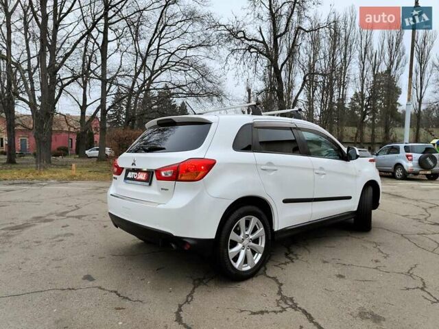 Белый Мицубиси Outlander Sport, объемом двигателя 2.4 л и пробегом 207 тыс. км за 9990 $, фото 19 на Automoto.ua