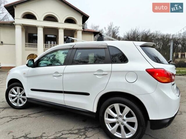 Белый Мицубиси Outlander Sport, объемом двигателя 2.4 л и пробегом 207 тыс. км за 9990 $, фото 9 на Automoto.ua