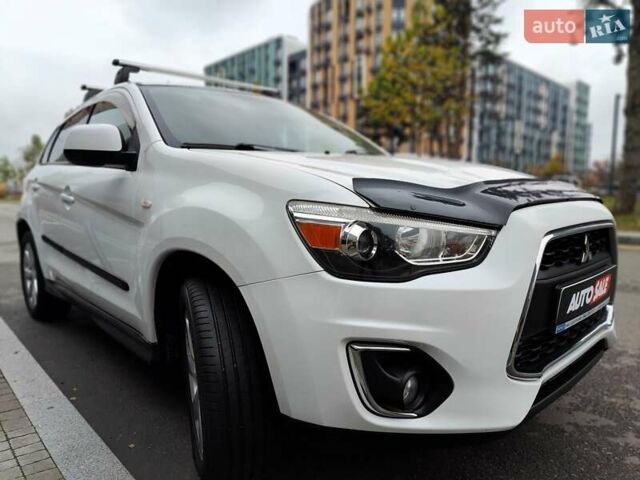 Белый Мицубиси Outlander Sport, объемом двигателя 2.4 л и пробегом 207 тыс. км за 9990 $, фото 32 на Automoto.ua