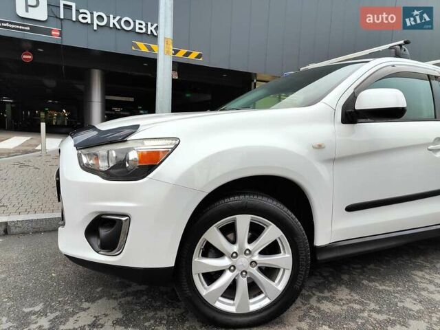 Белый Мицубиси Outlander Sport, объемом двигателя 2.4 л и пробегом 207 тыс. км за 9990 $, фото 5 на Automoto.ua