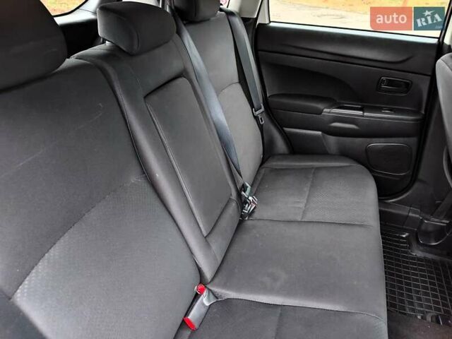 Белый Мицубиси Outlander Sport, объемом двигателя 2.4 л и пробегом 207 тыс. км за 9990 $, фото 55 на Automoto.ua