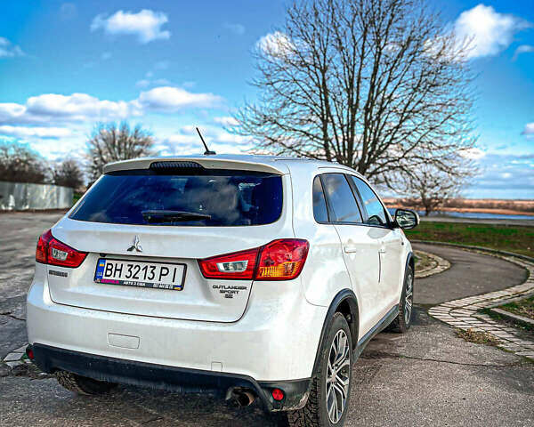 Белый Мицубиси Outlander Sport, объемом двигателя 2.4 л и пробегом 270 тыс. км за 14399 $, фото 11 на Automoto.ua