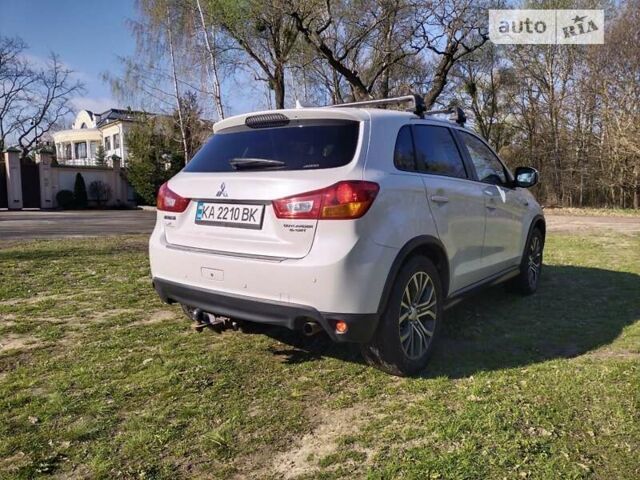 Білий Міцубісі Outlander Sport, об'ємом двигуна 2 л та пробігом 80 тис. км за 13500 $, фото 5 на Automoto.ua