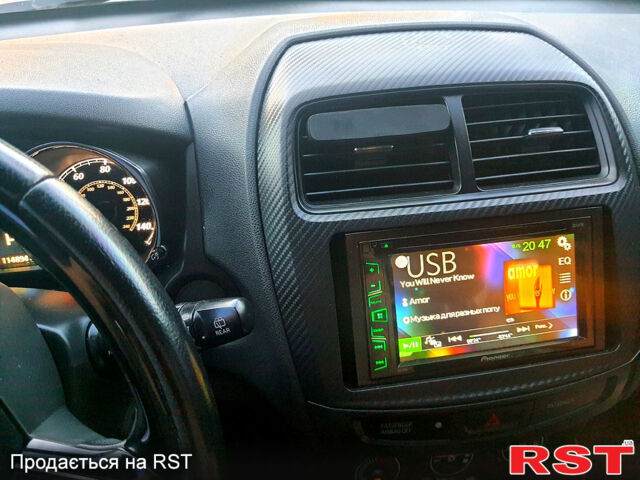 Білий Міцубісі Outlander Sport, об'ємом двигуна 2 л та пробігом 180 тис. км за 12000 $, фото 2 на Automoto.ua