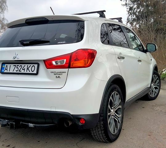 Білий Міцубісі Outlander Sport, об'ємом двигуна 2.4 л та пробігом 154 тис. км за 16800 $, фото 3 на Automoto.ua