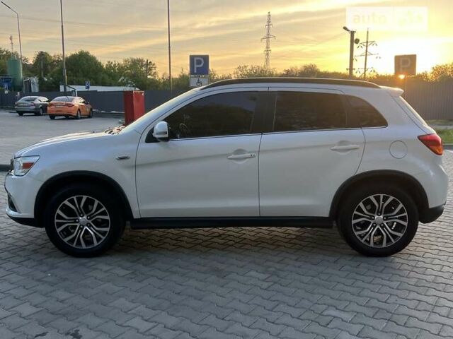 Белый Мицубиси Outlander Sport, объемом двигателя 2.4 л и пробегом 98 тыс. км за 12850 $, фото 6 на Automoto.ua