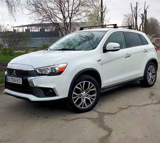 Білий Міцубісі Outlander Sport, об'ємом двигуна 2.4 л та пробігом 154 тис. км за 16800 $, фото 1 на Automoto.ua