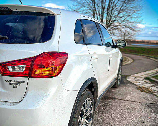 Белый Мицубиси Outlander Sport, объемом двигателя 2.4 л и пробегом 270 тыс. км за 14399 $, фото 10 на Automoto.ua