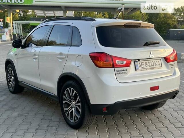 Білий Міцубісі Outlander Sport, об'ємом двигуна 2.4 л та пробігом 98 тис. км за 12850 $, фото 5 на Automoto.ua