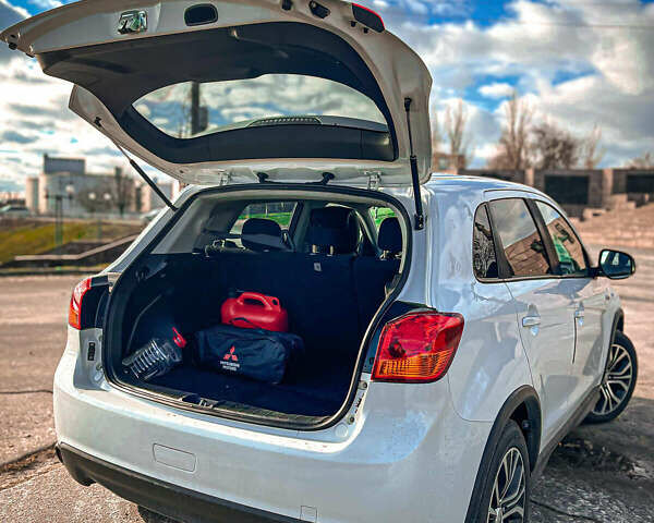 Белый Мицубиси Outlander Sport, объемом двигателя 2.4 л и пробегом 270 тыс. км за 14399 $, фото 18 на Automoto.ua