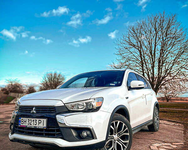 Белый Мицубиси Outlander Sport, объемом двигателя 2.4 л и пробегом 270 тыс. км за 14399 $, фото 2 на Automoto.ua