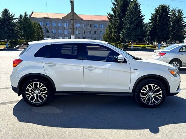 Белый Мицубиси Outlander Sport, объемом двигателя 2 л и пробегом 110 тыс. км за 12600 $, фото 5 на Automoto.ua
