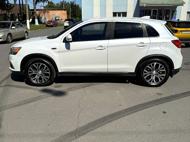 Белый Мицубиси Outlander Sport, объемом двигателя 2 л и пробегом 110 тыс. км за 12600 $, фото 4 на Automoto.ua