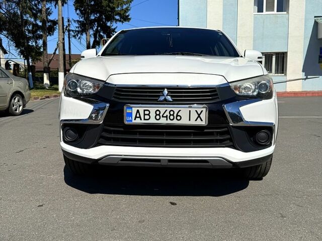 Белый Мицубиси Outlander Sport, объемом двигателя 2 л и пробегом 110 тыс. км за 12600 $, фото 1 на Automoto.ua