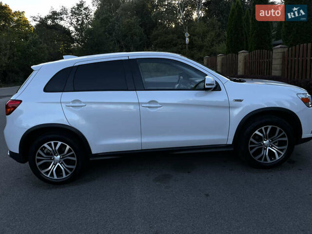 Білий Міцубісі Outlander Sport, об'ємом двигуна 2 л та пробігом 77 тис. км за 14000 $, фото 4 на Automoto.ua
