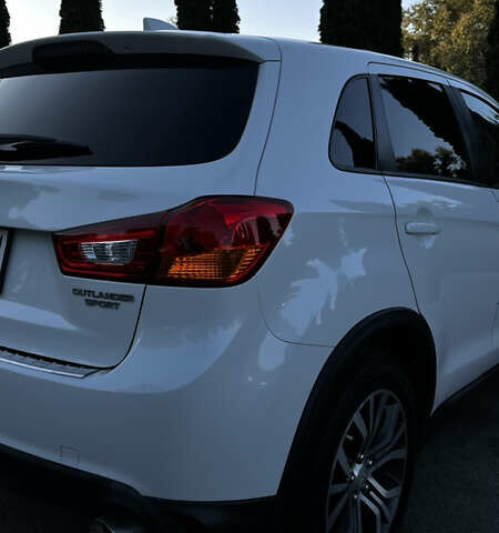 Білий Міцубісі Outlander Sport, об'ємом двигуна 2 л та пробігом 77 тис. км за 14000 $, фото 9 на Automoto.ua