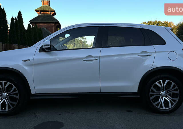 Білий Міцубісі Outlander Sport, об'ємом двигуна 2 л та пробігом 77 тис. км за 14000 $, фото 2 на Automoto.ua