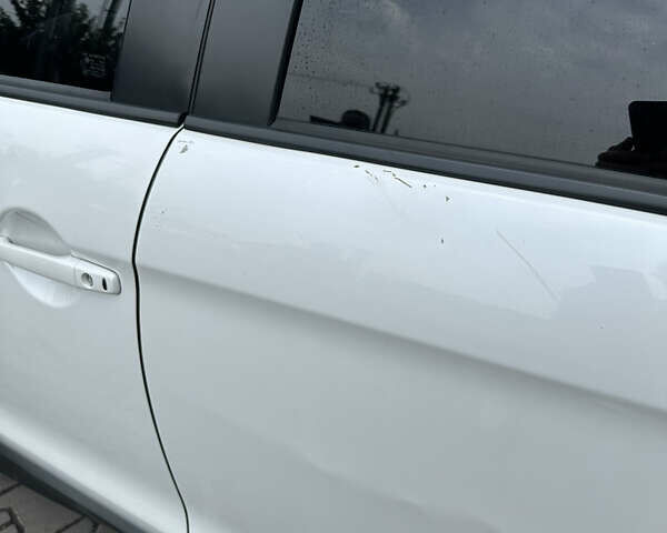 Белый Мицубиси Outlander Sport, объемом двигателя 2.36 л и пробегом 123 тыс. км за 10500 $, фото 8 на Automoto.ua