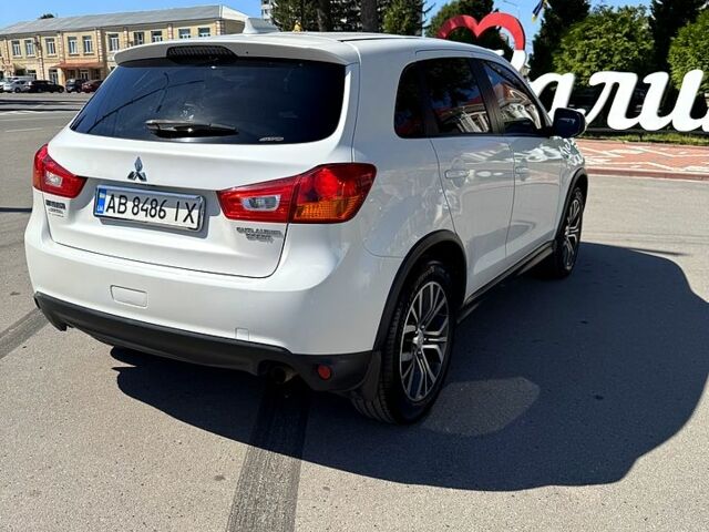Белый Мицубиси Outlander Sport, объемом двигателя 2 л и пробегом 110 тыс. км за 12600 $, фото 3 на Automoto.ua