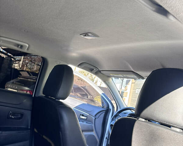 Белый Мицубиси Outlander Sport, объемом двигателя 2 л и пробегом 144 тыс. км за 16400 $, фото 30 на Automoto.ua