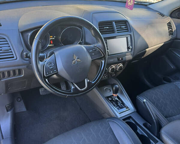 Белый Мицубиси Outlander Sport, объемом двигателя 2 л и пробегом 144 тыс. км за 16400 $, фото 15 на Automoto.ua