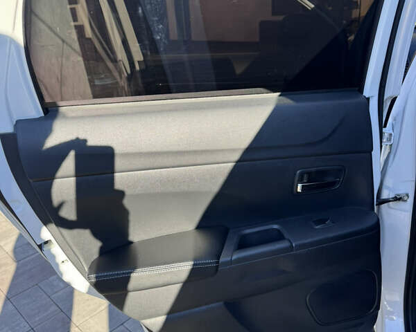 Белый Мицубиси Outlander Sport, объемом двигателя 2 л и пробегом 144 тыс. км за 16400 $, фото 16 на Automoto.ua