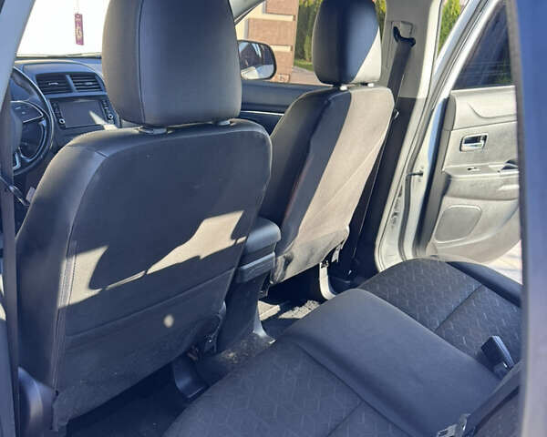 Белый Мицубиси Outlander Sport, объемом двигателя 2 л и пробегом 144 тыс. км за 16400 $, фото 22 на Automoto.ua