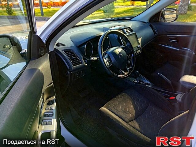Белый Мицубиси Outlander Sport, объемом двигателя 2 л и пробегом 90 тыс. км за 16500 $, фото 9 на Automoto.ua